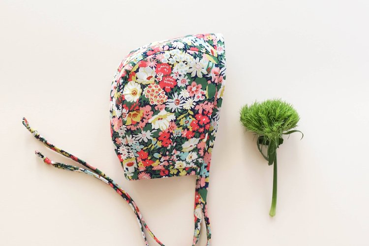 A versatile + stunning floral, you'll treasure Wild Poppy forever.
Why you'll love our brimless bonnets:
* Classic bonnet silhouette that sweetly frames your ba