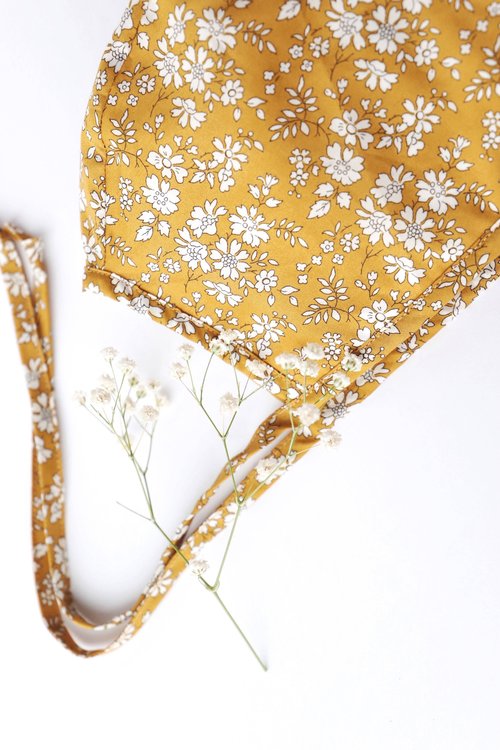 The perfect crown of posies, Buttercup is a perennial favorite.
Why you'll love our brimless bonnets:
* Classic bonnet silhouette that sweetly frames your baby’s