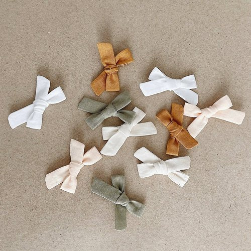 The perfect hair accessory for your precious little girl in our classic honey color!
Each bow is made of 100% cotton material, hand-sewn in Kansas and comes attached