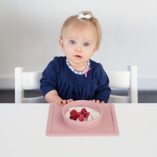 The ezpz Mini Bowl is a smaller version of the Happy Bowl, and it is designed for infants and toddlers. The suction feature of the Mini Bowl helps little ones to