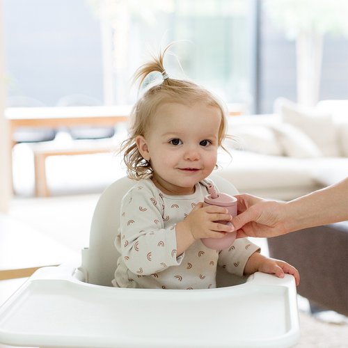 Learning to drink out of an open cup is an important developmental milestone, and the Tiny Cup helps baby transition from bottle to cup. Open cup drinking supports