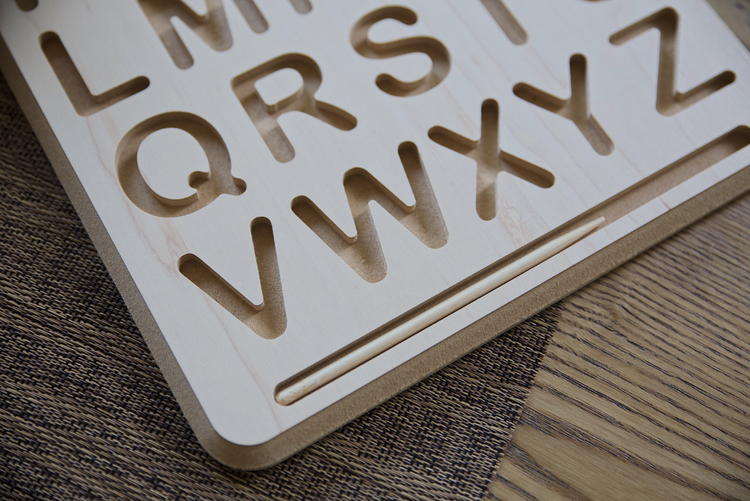The Montessori approach recognizes that a child’s potential for learning is greatest when provided with tactile, multisensory tools. A letter tracing board capitaliz