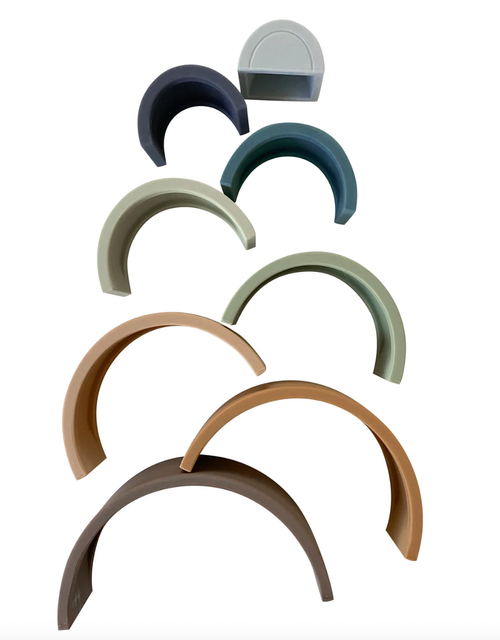 The Silicone Rainbow Teething Stacker is the ultimate multi-purpose toy. Teething + Play! Your baby will quickly discover how the stacking arches make the best sooth