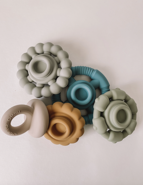 The River Teething Stacker is the ultimate multi-purpose toy. Teething + Play! Your baby will quickly discover how the stacking rings make the best soothing teethers