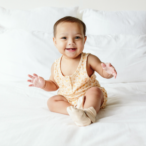 The Goumi piece everyone’s been asking for. Our romper is the coziest day wear for your babes. Perfect for warm weather play and cozy enough for sleep. Plus it looks