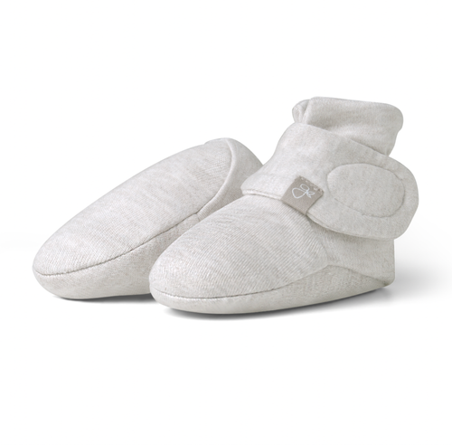 Never lose another sock. A super-soft organic baby boot that is adjustable and stays on no matter what. Featuring our two-part adjustable closure system that remains