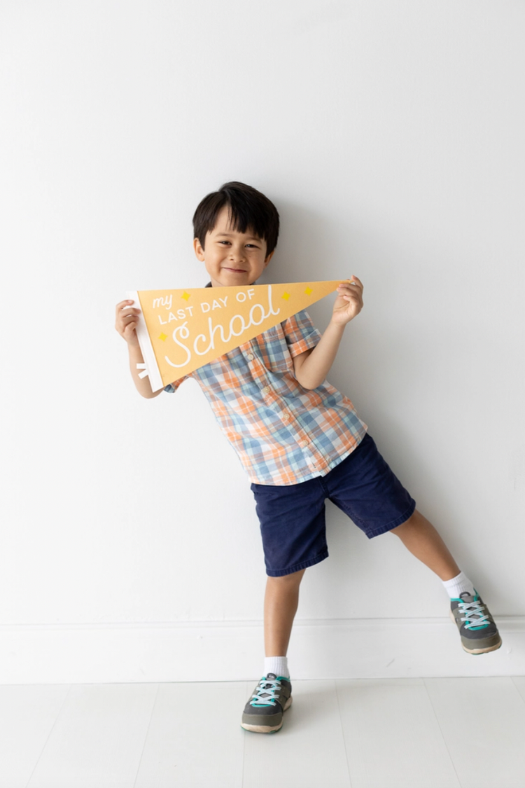 • Celebrate the first day of a new grade the last day before summer vacation year after year by posing with these adorable and gender-neutral photo props pennant fla