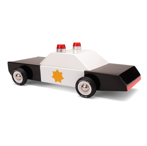 Boxy and assertive, shiny black-and-white paint scheme, gold star and with two cherries on top. Making sure racing stays at the track.
Materials & Info: Solid Be