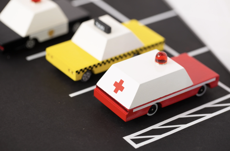 We’ve got a mini medic here to lend a helping hand! This Red and White Candycar Ambulance is first on the scene. Part of our new candycar line, a cute 3 inches long.