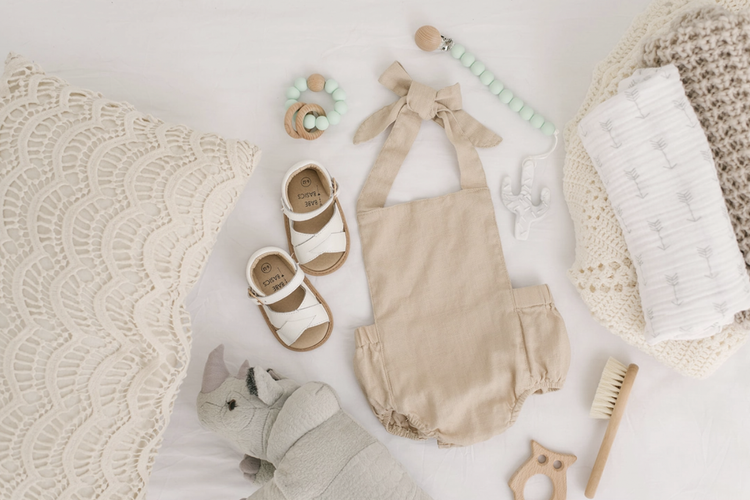 With classic, neutral styles and beautiful details that let your babe’s personality shine, these rompers are a perfect choice for pregnancy reveal photos, monthly