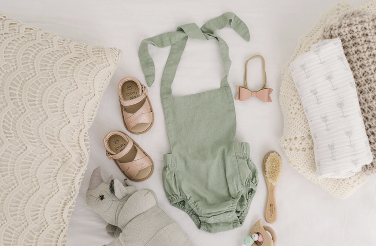 With classic, neutral styles and beautiful details that let your babe’s personality shine, these rompers are a perfect choice for pregnancy reveal photos, monthly