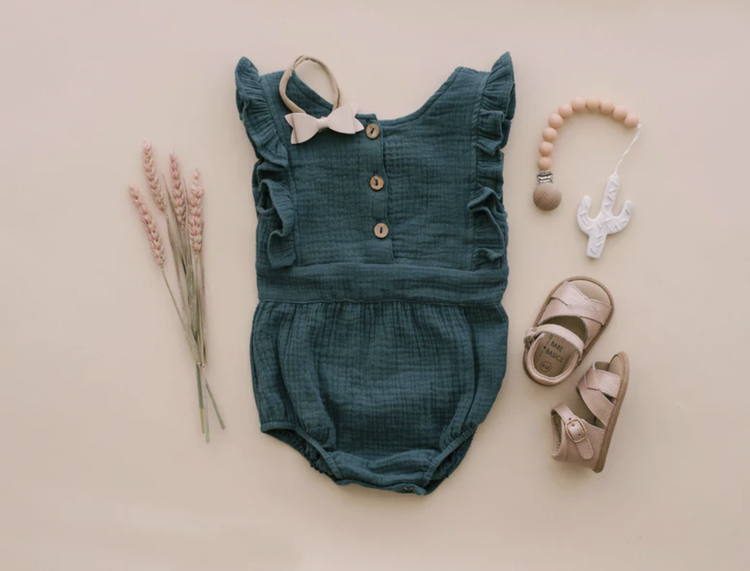 With classic, neutral styles and beautiful details that let your babe’s personality shine, these rompers are a perfect choice for pregnancy reveal photos, monthl