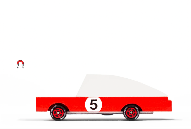 Smoking tires all day long, and chasing speed at the track. Part of our new candycar line, a cute 3 inches long. One of two of our racers, who said speed comes with