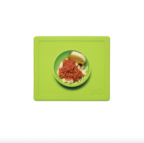 The ezpz Happy Bowl is an all-in-one placemat + bowl that suctions to the table, which means that it captures the mess and eliminates tipped bowls and plates. The