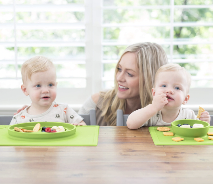 The ezpz Happy Bowl is an all-in-one placemat + bowl that suctions to the table, which means that it captures the mess and eliminates tipped bowls and plates. The