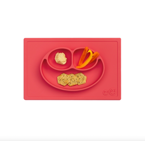 The Happy Mat is ezpz's award-winning flagship product. It is an all-in-one placemat + plate that suctions to the table, which means that it captures the mess and r