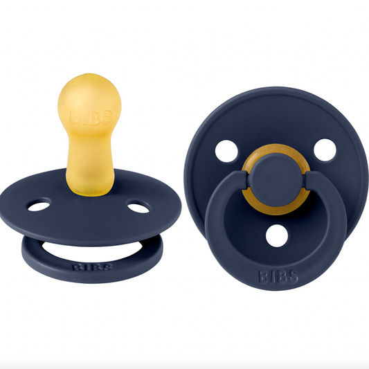 Our Colour pacifier is the original BIBS pacifier and has been on the market for over 40 years. It has the signature round BIBS shield with three vent holes and roun
