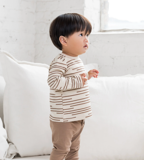 With clean lines and set-in sleeve details, the Turk Long Sleeve pairs seamlessly with your favorite bottoms, both tucked and untucked. This super-soft tee is a c