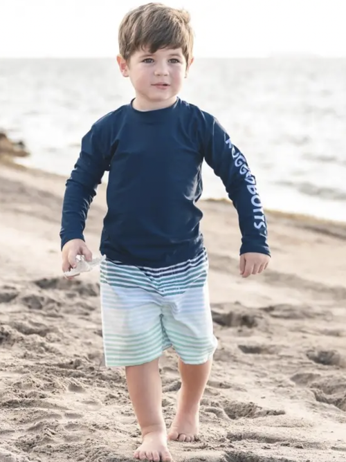 Complete your boy's summer swim outfit with these Swim Trunks. With its inner mesh lining, not only will he look good but feel good, too.
100% Polyester
Imported / D