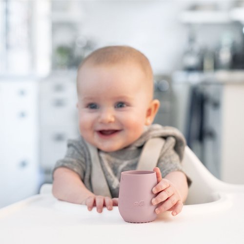 Learning to drink out of an open cup is an important developmental milestone, and the Tiny Cup helps baby transition from bottle to cup. Open cup drinking supports
