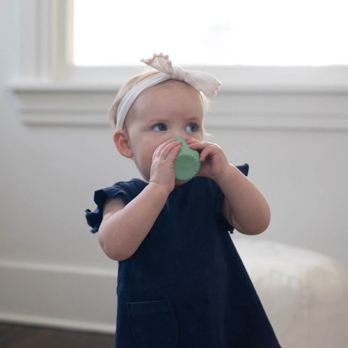 Learning to drink out of an open cup is an important developmental milestone, and the Tiny Cup helps baby transition from bottle to cup. Open cup drinking supports