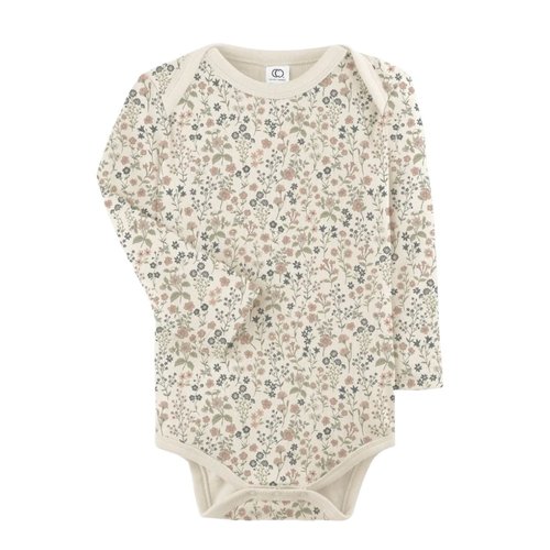 The Sorren is ready for family photos, playground afternoons, and everything in between. With delicate ruffle details, cinched cuffs, and a coconut button closur