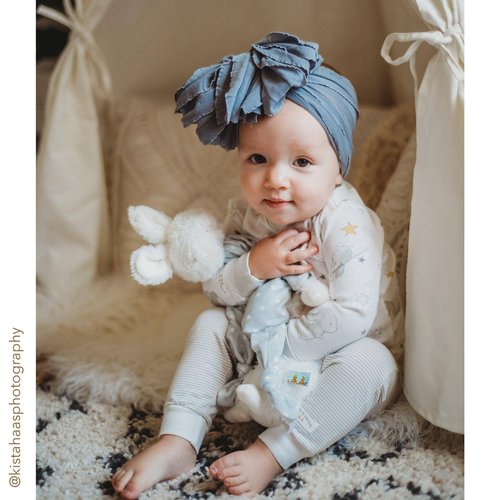 Our Knotty Friend loveys have won the hearts of wee one's around the world. A sweet fur baby-safe embroidered face with velour floppy body in glacier grey with cream