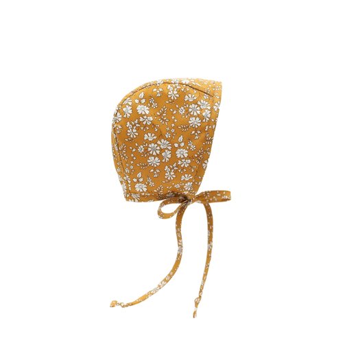 The perfect crown of posies, Buttercup is a perennial favorite.
Why you'll love our brimless bonnets:
* Classic bonnet silhouette that sweetly frames your baby’s