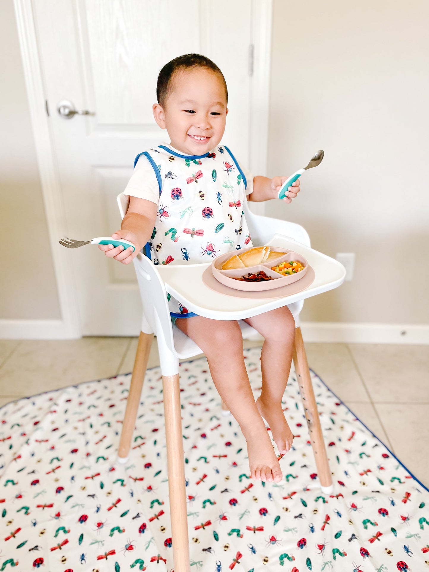 Bug World Splash Mat - from the World Of Eric Carle - A Waterproof Catch-All for Highchair Spills and More!