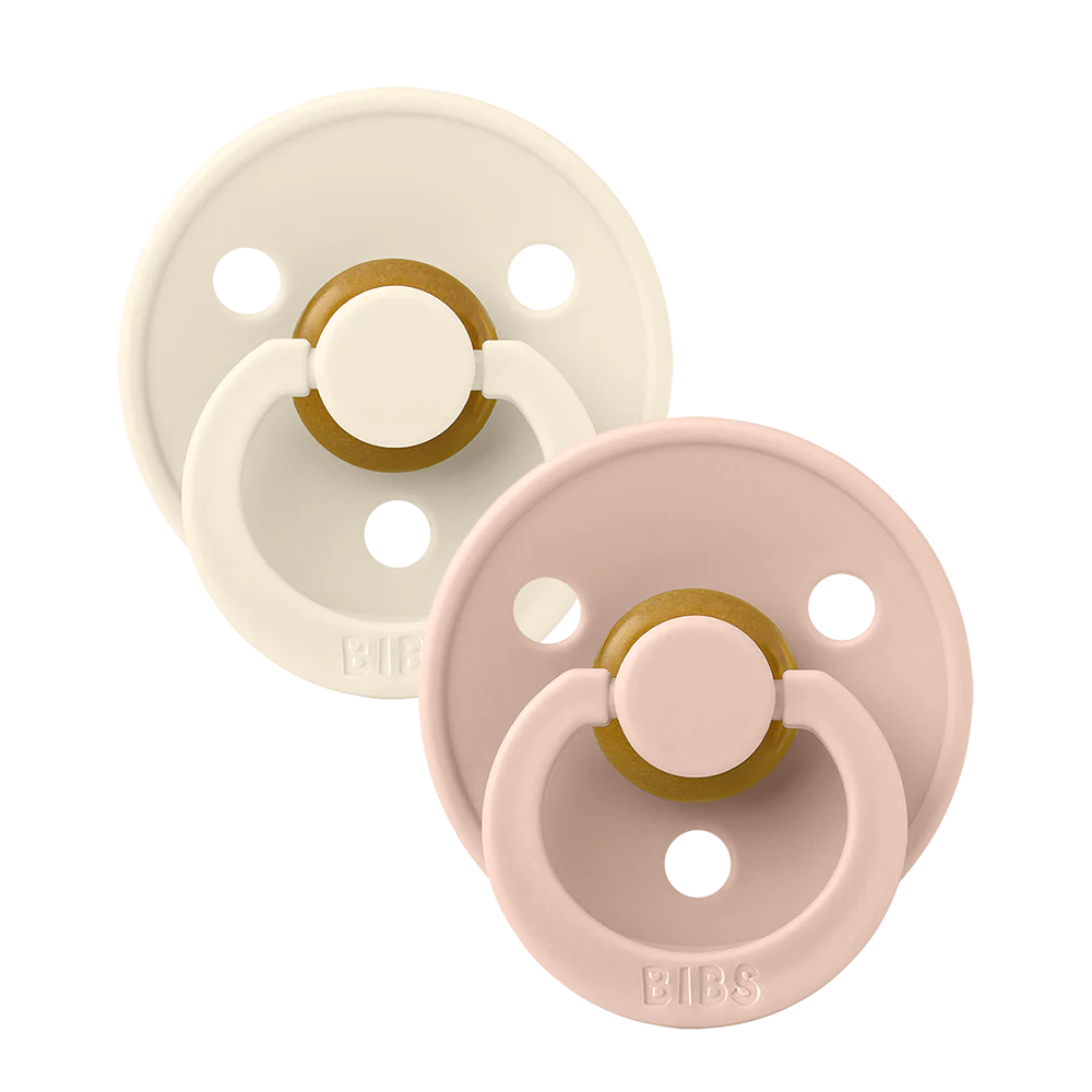 
Our Colour pacifier is the original BIBS pacifier and has been on the market for over 40 years. It has the signature round BIBS shield with three vent holes and rou