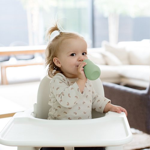 

Learning to drink out of an open cup is an important developmental milestone, and the Tiny Cup helps baby transition from bottle to cup. Open cup drinking supports