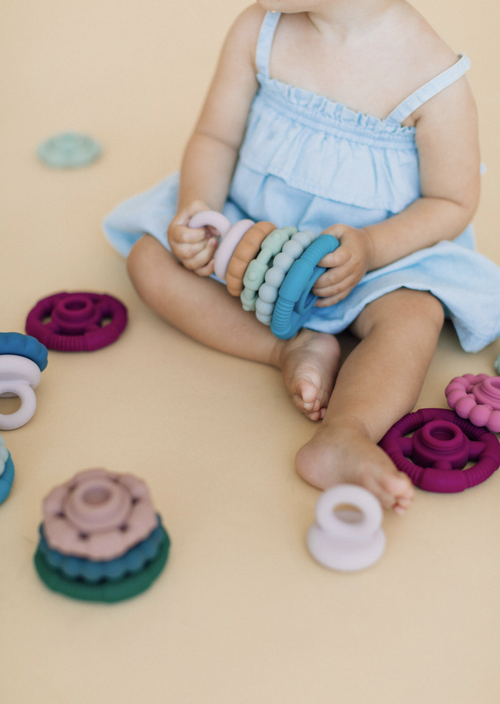 The River Teething Stacker is the ultimate multi-purpose toy. Teething + Play! Your baby will quickly discover how the stacking rings make the best soothing teethers