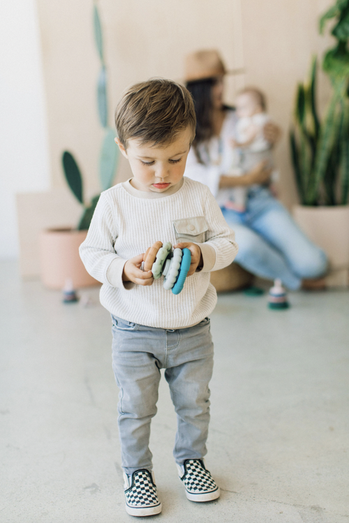 The River Teething Stacker is the ultimate multi-purpose toy. Teething + Play! Your baby will quickly discover how the stacking rings make the best soothing teethers