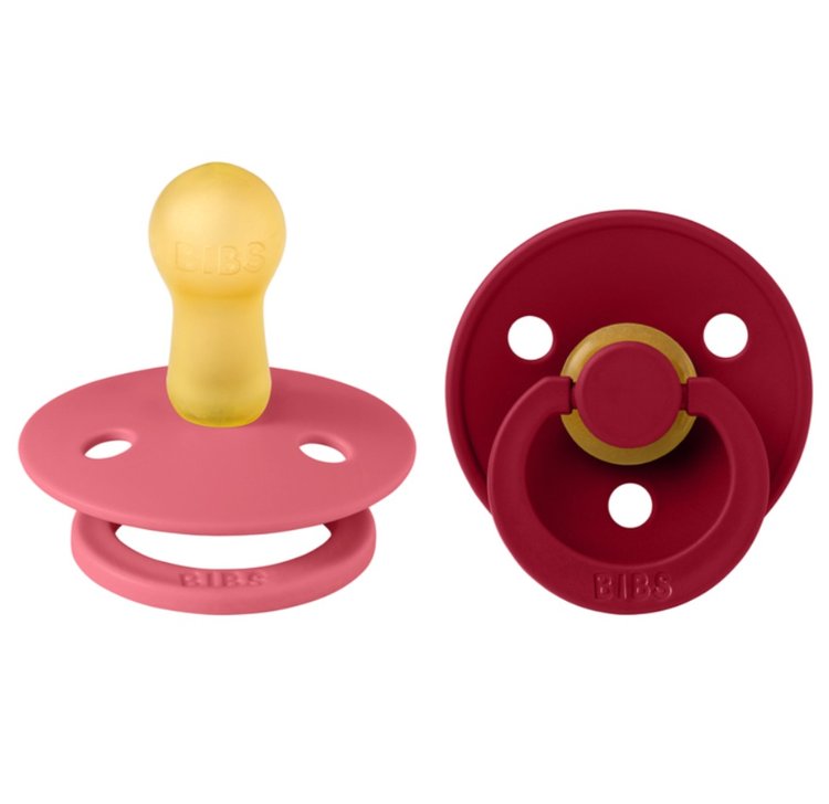 Our Colour pacifier is the original BIBS pacifier and has been on the market for over 40 years. It has the signature round BIBS shield with three vent holes and roun