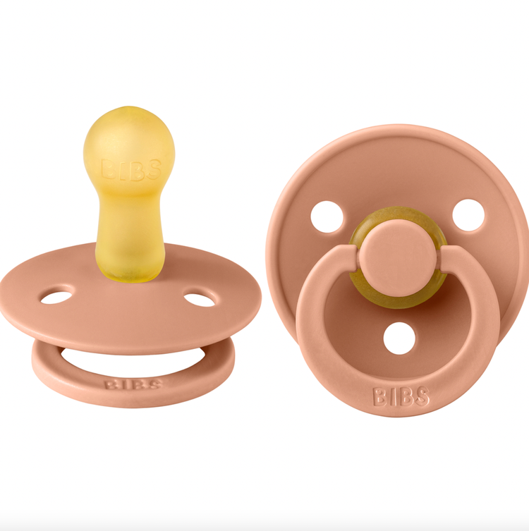 
Our Colour pacifier is the original BIBS pacifier and has been on the market for over 40 years. It has the signature round BIBS shield with three vent holes and rou
