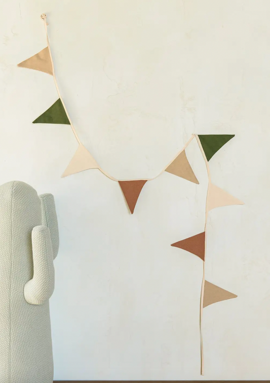 Two words to describe our pretty pennant garlands: Beauty &amp; Simplicity! Brighten up your child’s bedroom or playroom in a snap with these playful gender-neutral 