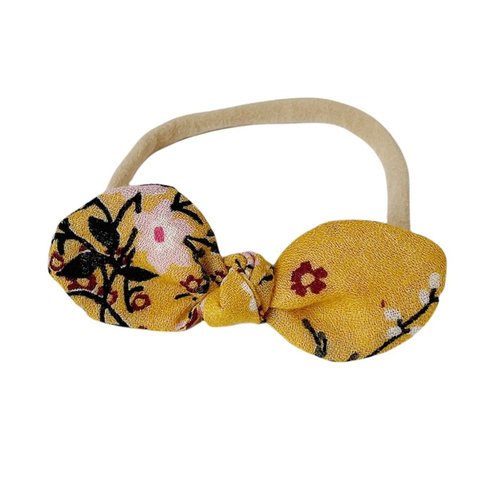 The perfect hair accessory for your precious little girl in our limited edition yellow floral color!
Due to the nature of how our Limited Edition fabrics are purchas