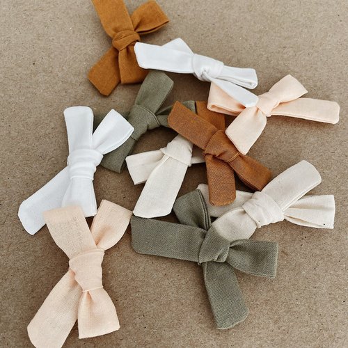 The perfect hair accessory for your precious little girl in our classic earth color!
Each bow is made of 100% cotton material, hand-sewn in Kansas and comes attached