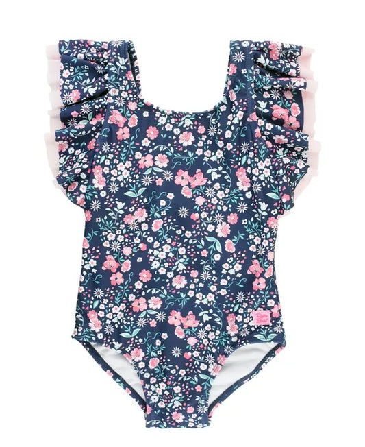 

Soft, sweet flowers adorn a bold background on this blue floral flutter sleeve swimsuit for girls. Made from a fabric with UPF 50+ sun protection built in and feat